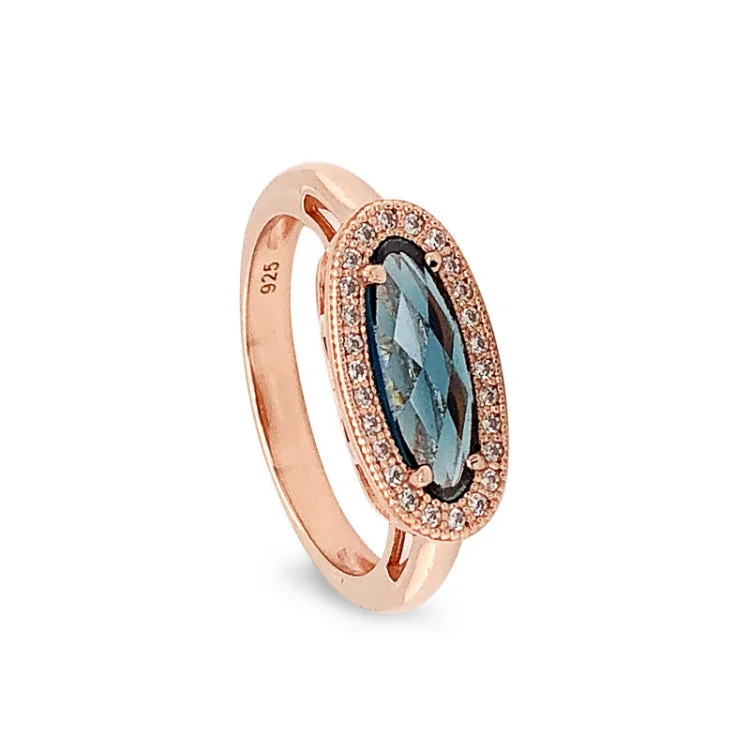 Custom-designed engagement rings for women -Rose gold finish sterling silver micropave oblong ring with simulated london blue topaz and simulated diamonds