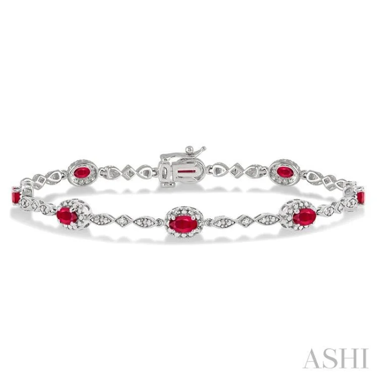 Elegant cuff bracelets for women -5x3 MM Oval Cut Ruby and 1/20 Ctw Single Cut Diamond Bracelet in 10K White Gold