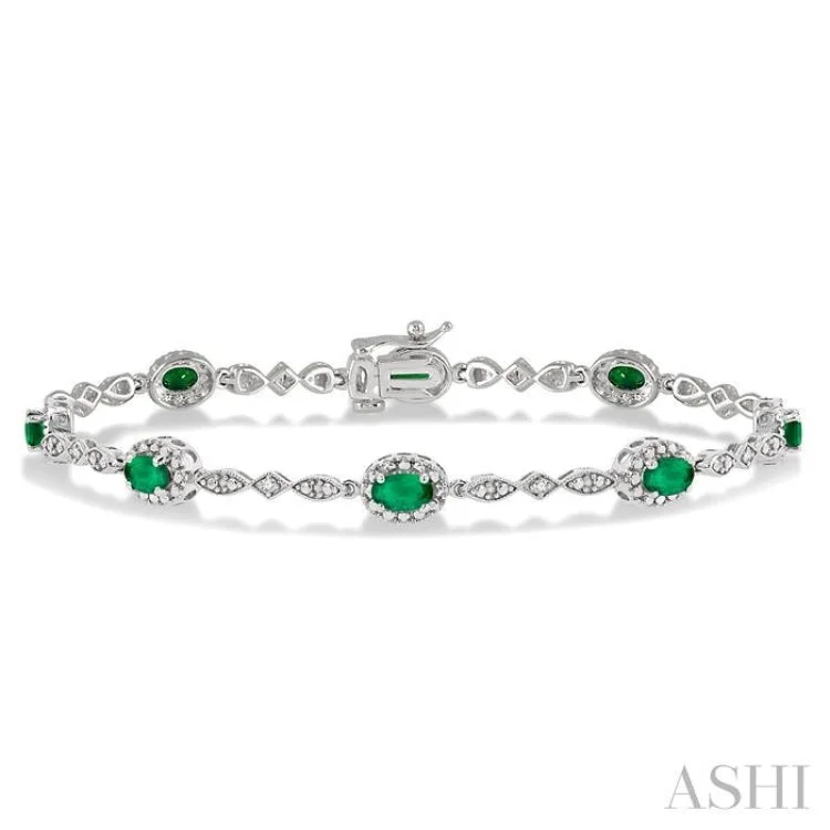 Vintage bangle bracelets for women -5x3 MM Oval Cut Emerald and 1/20 Ctw Single Cut Diamond Bracelet in 14K White Gold