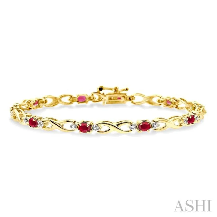 Rose gold bracelets for women -4x3 MM Oval Cut Ruby and 1/10 Ctw Single Cut Diamond Bracelet in 10K Yellow Gold