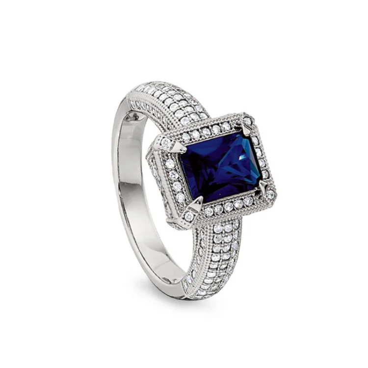 White gold engagement rings for women -Platinum Finish Sterling Silver Micropave Emerald Cut Synthetic Blue Sapphire Ring with Simulated Diamonds