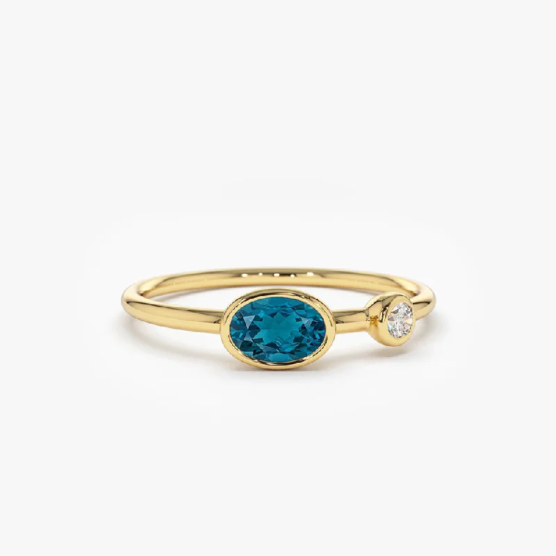 Fancy diamond engagement rings for women -14k Gold Oval London Blue Topaz  and Diamond Ring